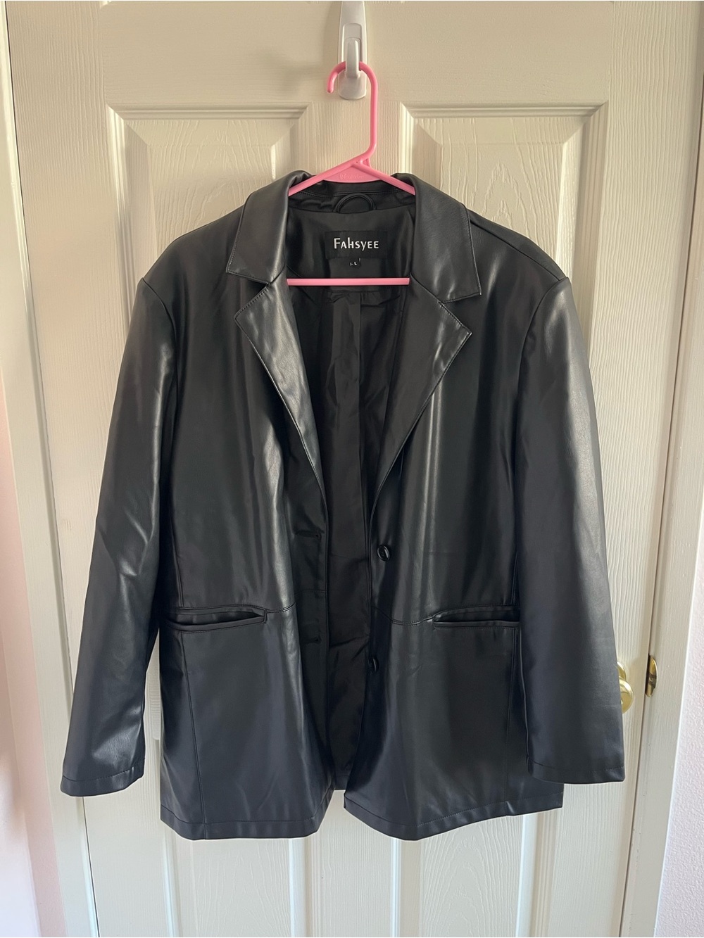 black faux leather coat